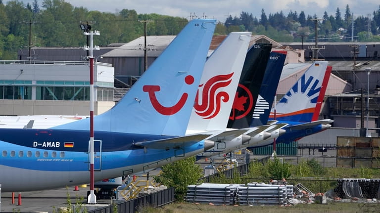 Boeing 737 Max airplanes, including one belonging to TUI Group,...