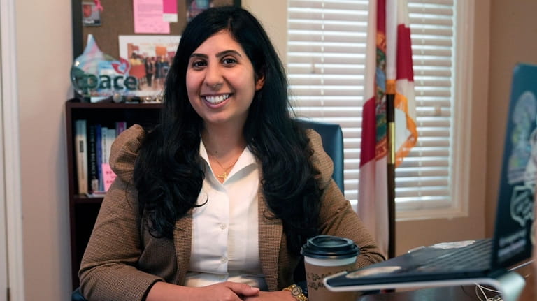 Florida state Rep. Anna Eskamani smiles in her office Wednesday,...