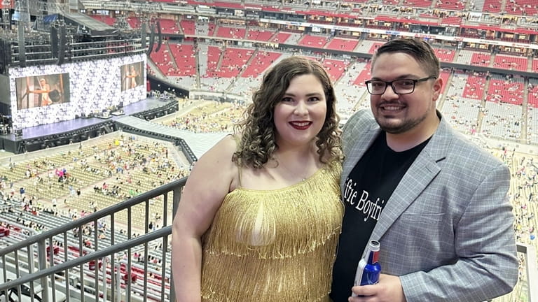 Caitlyn Tumino, of Huntington, attends the Taylor Swift's Eras Tour...