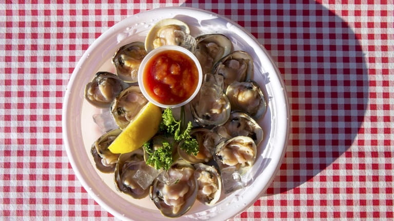 Little neck clams are served on the half shell at...