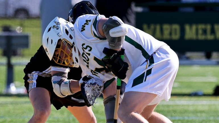 Ward Melville F/O Madden Murphy wins the faceoff against Sachem North...