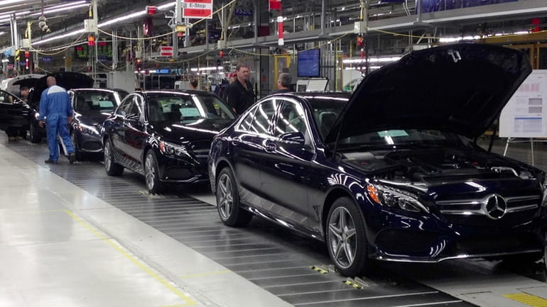The redesigned Mercedes-Benz C-Class sedan reaches its final assembly stage...