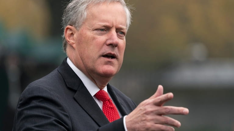Mark Meadows speaks with reporters at the White House, Oct....