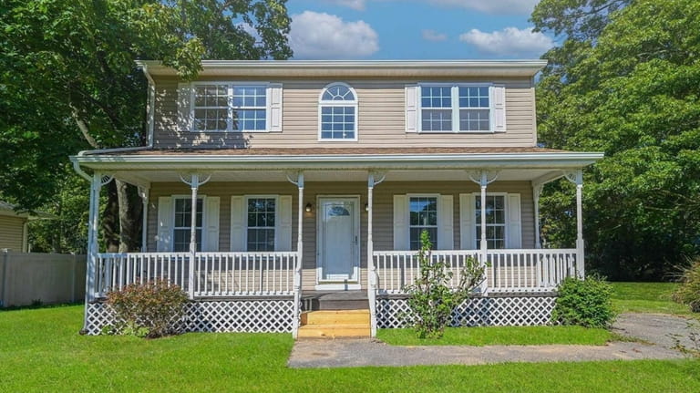 This $549,999 Mastic home sits on 0.32 acre.