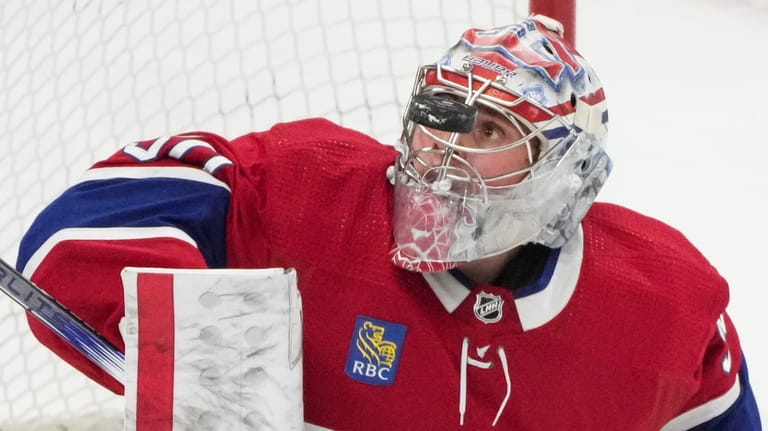 Montreal Canadiens goaltender Cayden Primeau watches the puck during the...