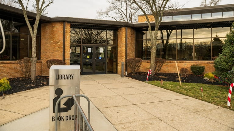 Wyandanch Public Library, pictured here, spent $100,068 on the salary of...
