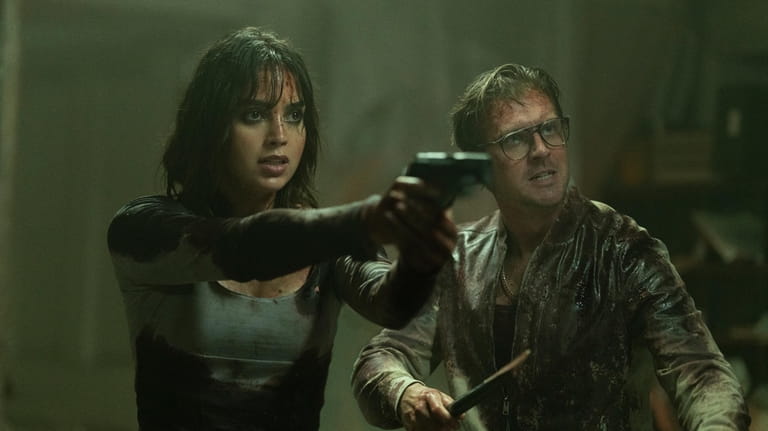 This image released by Universal Pictures shows Melissa Barrera and...
