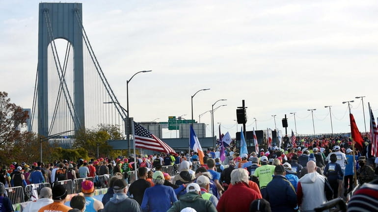Runners in 2021 begin the New York City Marathon on...