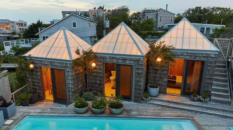 A renovation included the addition of three pyramid-shaped structures that...