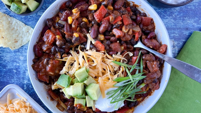 Red and black beans, lots of vegetables, chocolate and seasoning make...