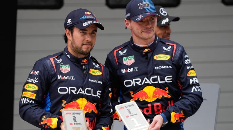 Sprint race winner Red Bull driver Max Verstappen, right, of...