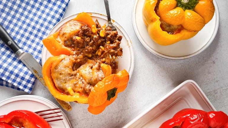 Bell peppers filled with layers of cheese and flavorful ground...