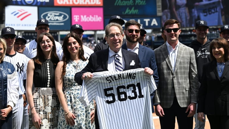 John Sterling, play-by-play announcer of the New York Yankees, stands...