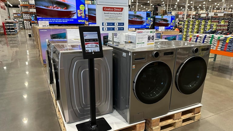 Appliances are displayed in a Costco warehouse on Sunday, March...