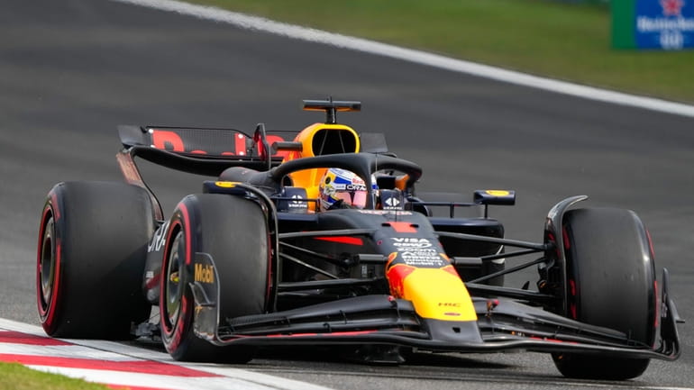 Red Bull driver Max Verstappen of the Netherlands steers his...