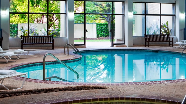 Take a dip in the indoor pool inside Radisson Hotel...