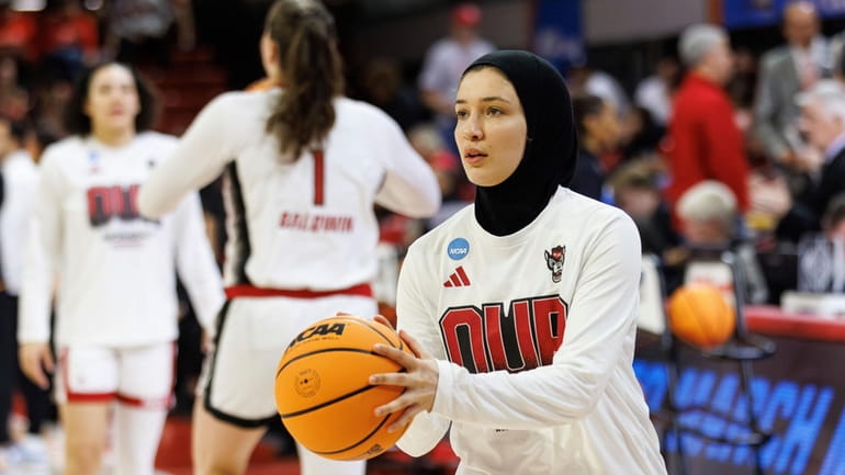 North Carolina State's Jannah Eissa warms up prior to a...