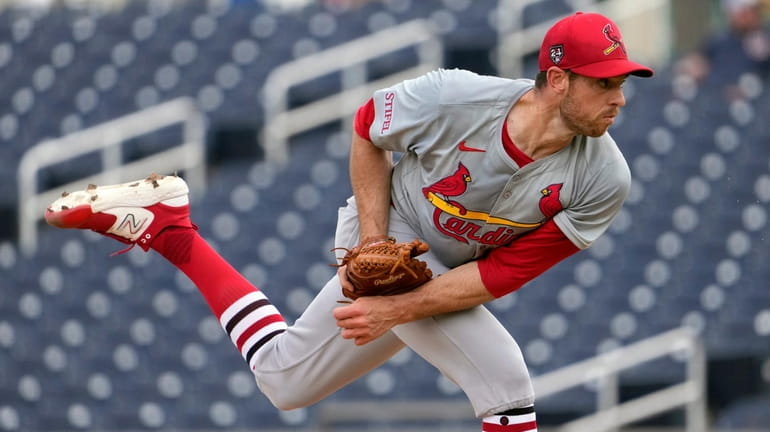 Cardinals pitcher Steven Matz throws during the third inning of...