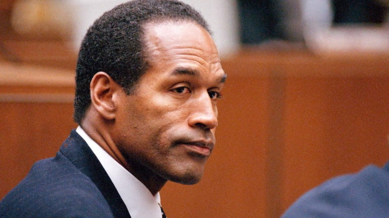 O.J. Simpson sits at his arraignment in Superior Court in...