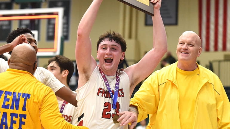 Jake Bock of Friends Academy reacts after the Quakers' 55-49...