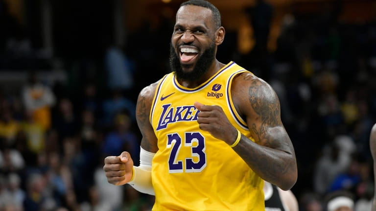 Los Angeles Lakers forward LeBron James (23) looks toward the...