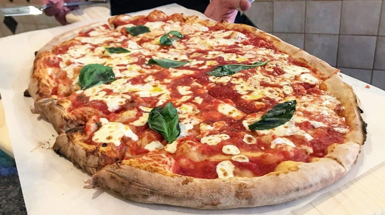 At Il Vecchio Forno in Huntington, the specialty is "pizza...