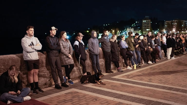 Crowds gather for the Anzac Day dawn service at Coogee...