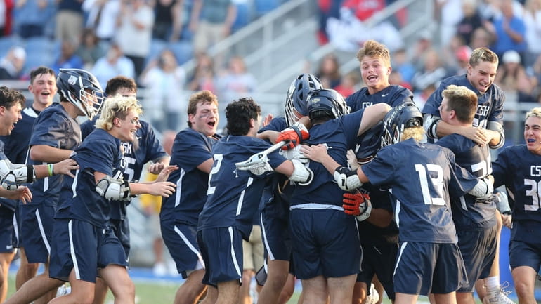 Cold Spring Harbor celebrates their win during New York State...