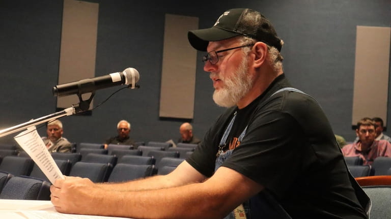 John Robinson, a retired coal miner with black lung, speaks...