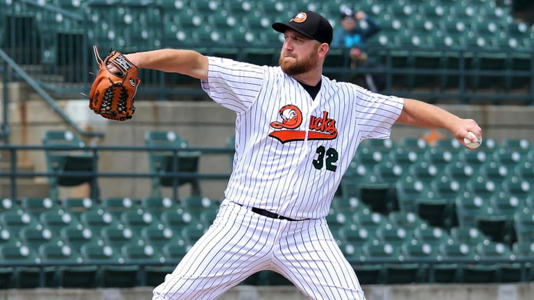 Long Island Ducks starting pitcher Bennett Parry delivers a pitch...