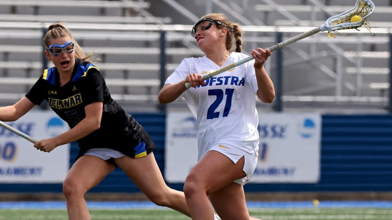 Hofstra attack Taylor Mennella shoots and scores against Delaware, in...
