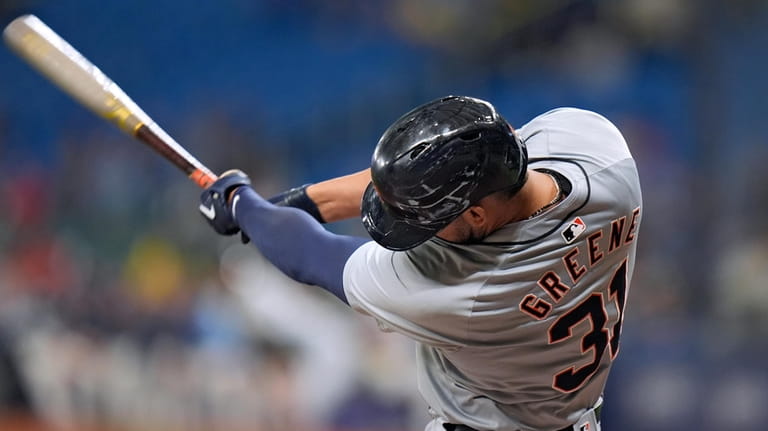 Detroit Tigers' Riley Greene lines a single off Tampa Bay...