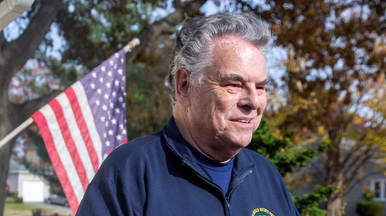 Rep. Peter King speaks outside his home after announcing he won't...