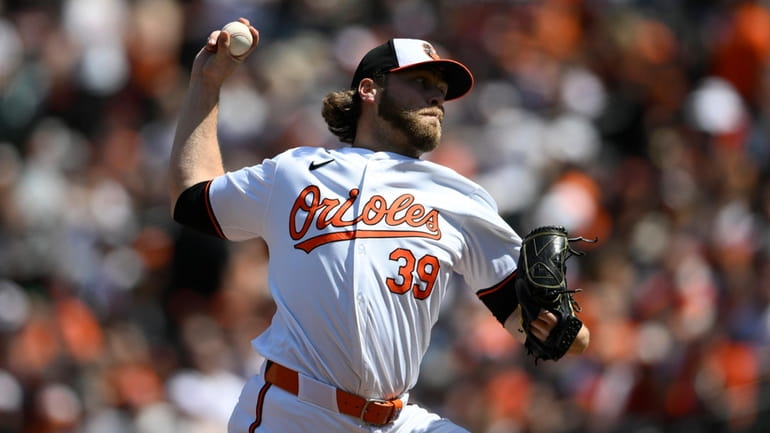 Baltimore Orioles pitcher Corbin Burnes throws during the first inning...