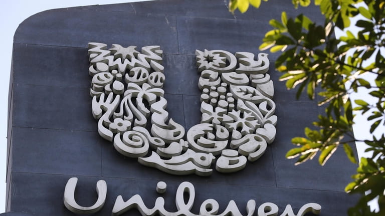 A Unilever logo is displayed outside the head office of...