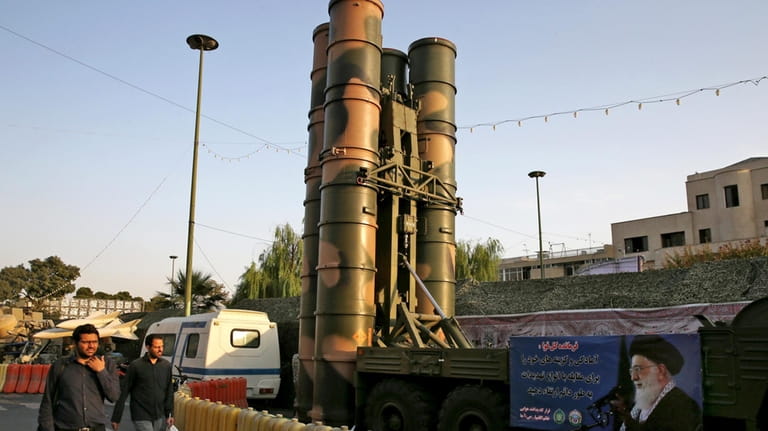 A Russian-made S-300 air defense system sits on display for...