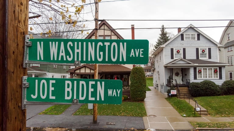 A Joe Biden Way road sign is seen in Scranton,...