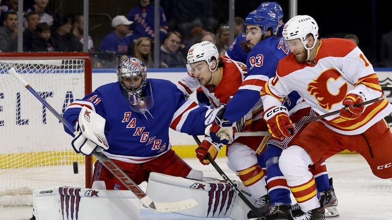 Jaroslav Halak #41 of the New York Rangers defends the...