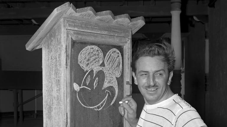 Walt Disney, creator of Mickey Mouse, poses at the Pancoast...