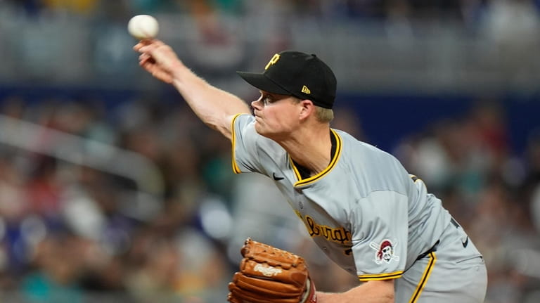 Pittsburgh Pirates' Ryder Ryan delivers a pitch during the fifth...