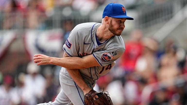 Mets pitcher Tyler Jay (74) delivers during the ninth inning...