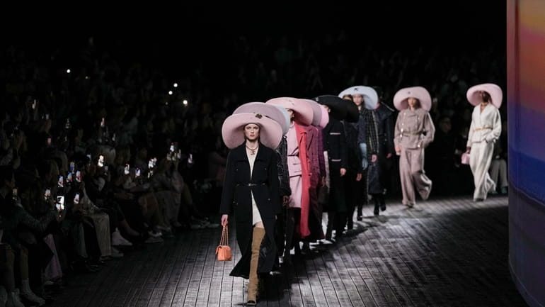 Models wear creations as part of the Chanel Fall/Winter 2024-2025...