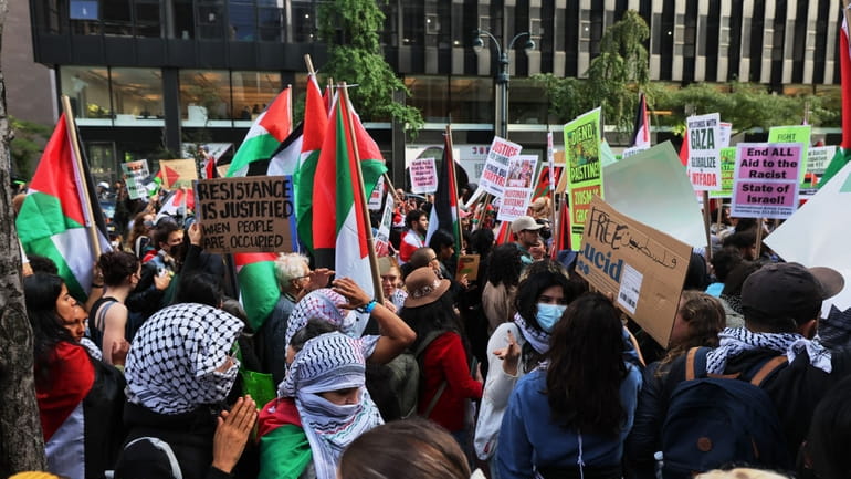 Pro-Palestinian demonstrators rally for Gaza at the Israeli consulate in...
