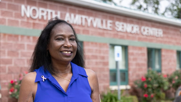 Susana Ifill of Amityville, who volunteers with Sisters of Greater Long Island,...