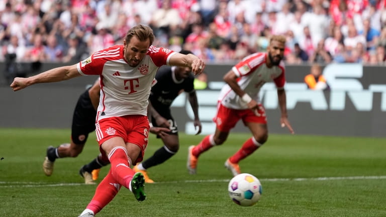 Bayern's Harry Kane scores his side's second goal from penalty...