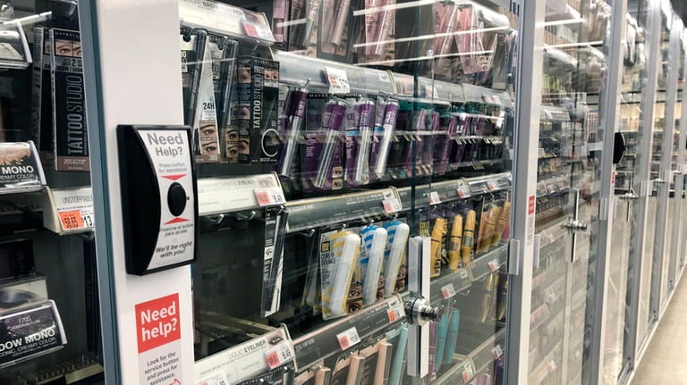 Beauty products are locked up at a Walgreens in Queens....