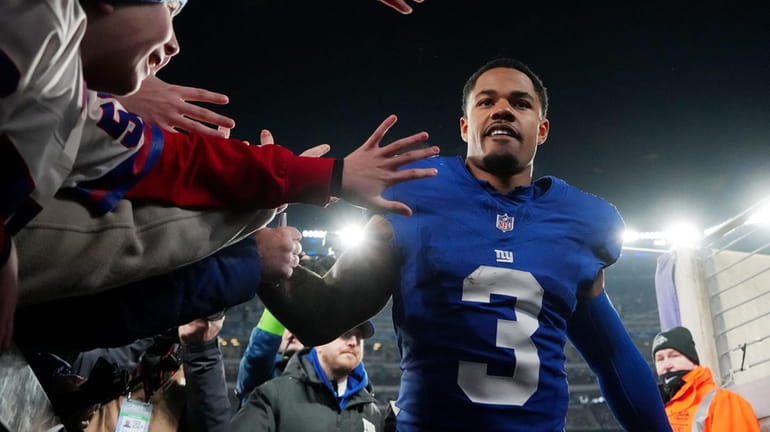 Sterling Shepard #3 of the Giants walks off the field after...