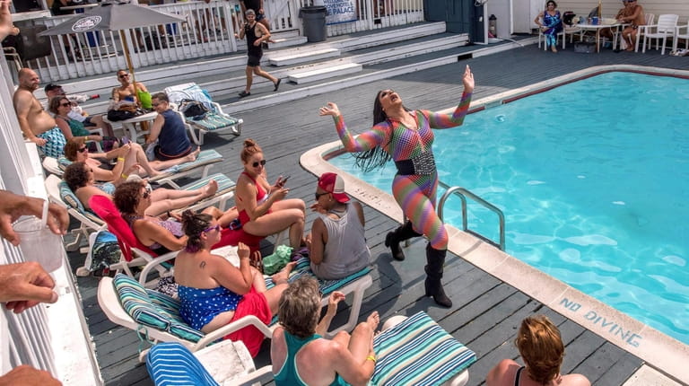 Guests get a poolside drag show at the Ice Palace...