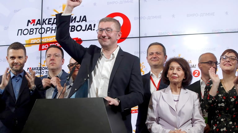 Hristijan Mickoski, center left, the leader of the opposition conservative...