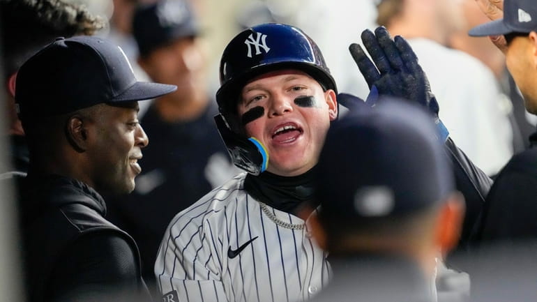 New York Yankees' Alex Verdugo celebrates after hitting a solo...